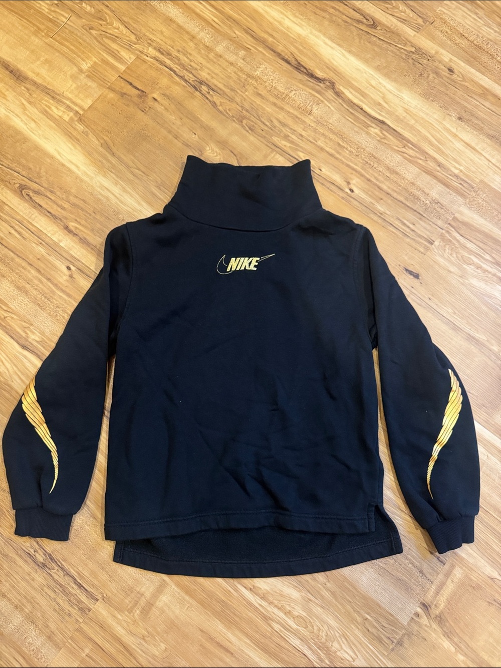 Girls Nike Black Pullover Turtleneck Tunic with Gold Swoosh and Sleeve Accents